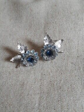 Vintage Sarah Coventry Floral Clip-on Earrings with Blue Center Stones